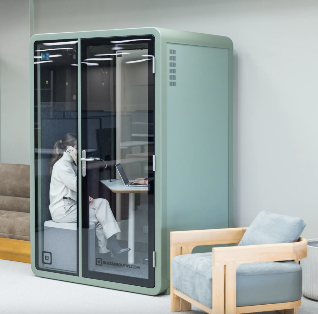 Person working inside a Bureau booth