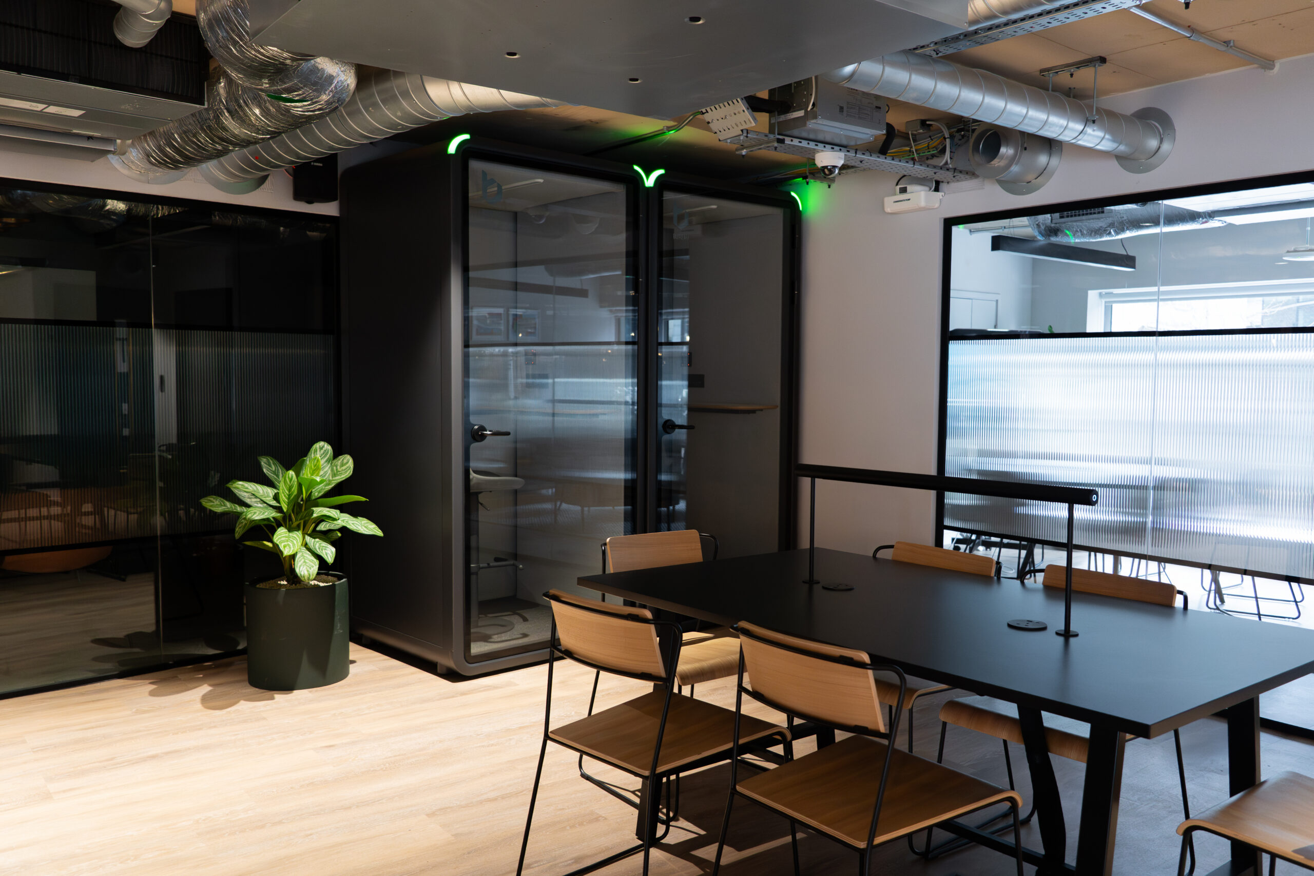 Bureau London showroom with two booths and a meeting table