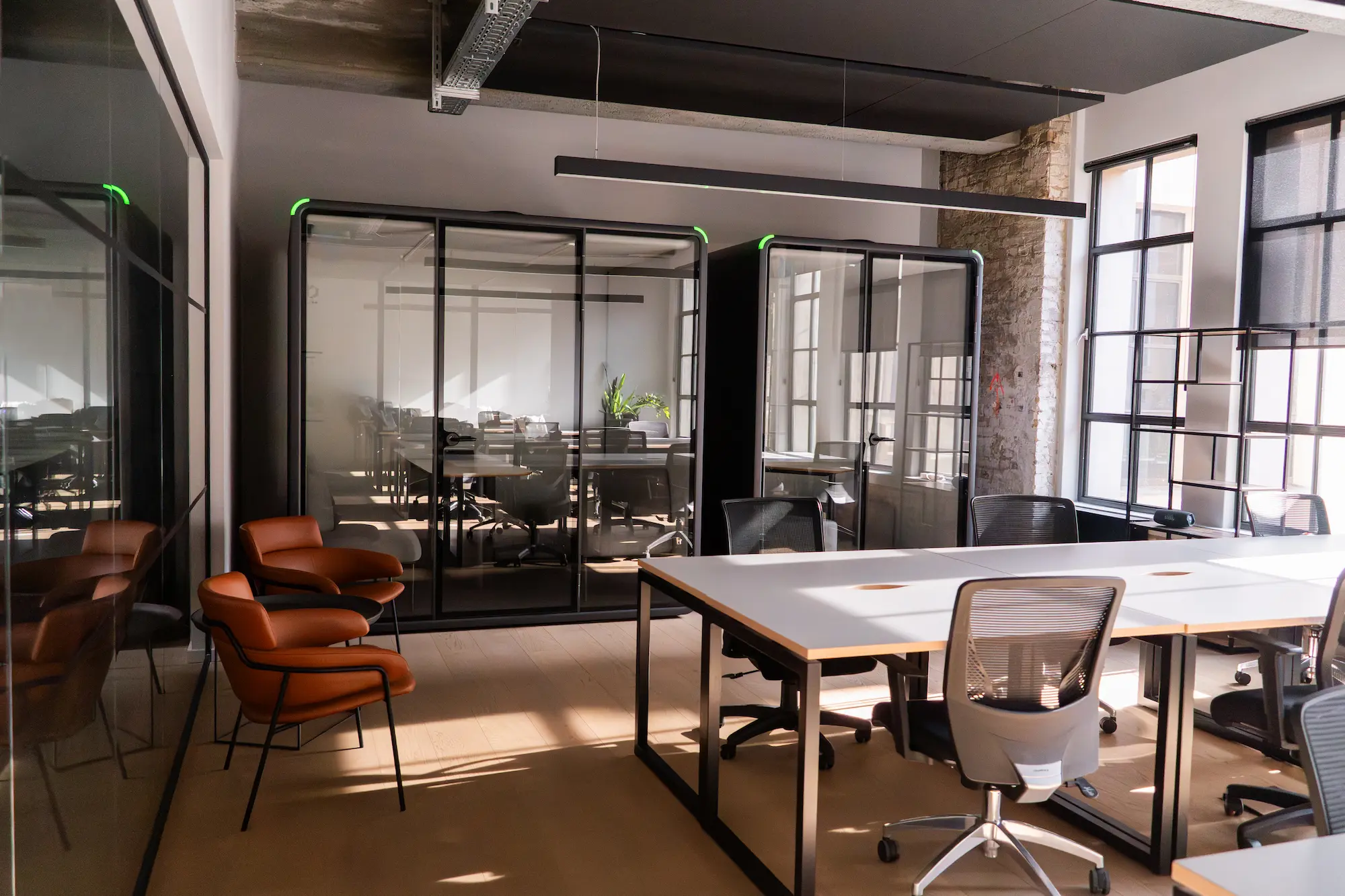 Bureau meeting booth beside a boardroom table